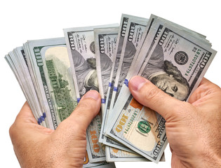 Man count or counting the new us dollars or money. New US Dollar bills bundle counting with hand isolated on white background including clipping path.