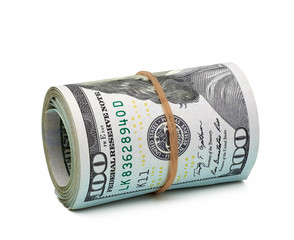 Rolled American dollars banknotes. Close up shot isolated on white background including clipping...