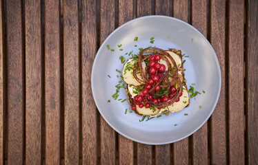 Open face sandwich with cranberries and potatoes