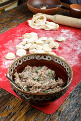 mince and dumplings in the background
