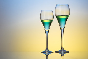 two glasses with cocktails