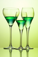 three glasses with cocktails