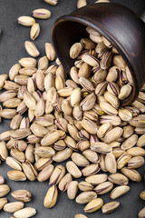 pistachios scattered on a colorful background