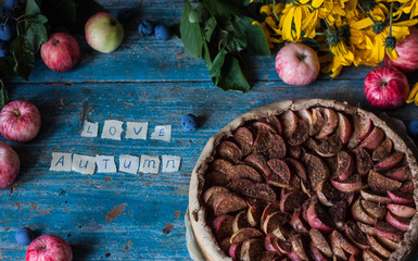 Apple pie on wooden blue rustic