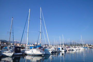 Fototapeta premium Sailing yachts and motor boats, Corsica