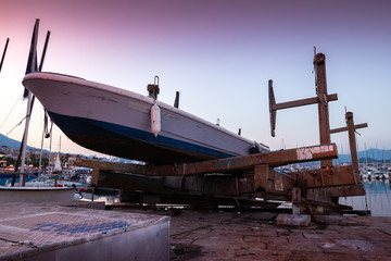 Motor boat is under repair in port of Ajaccio
