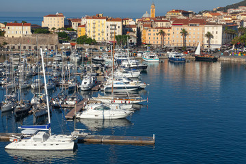 Fototapeta na wymiar Ajaccio port. Coastal cityscape with yachts