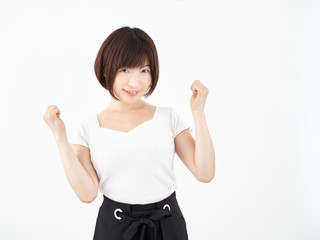 ガッツポーズで応援をする女性