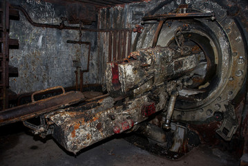 An abandoned bunker, an old military pillbox, an infantry weapon preserved after the war