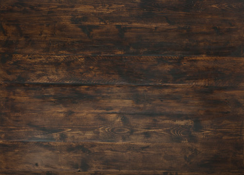 Old dark textured wooden background, brown wood stained style