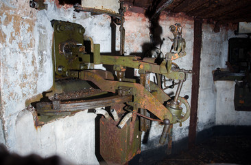 An abandoned bunker, an old military pillbox, an infantry weapon preserved after the war