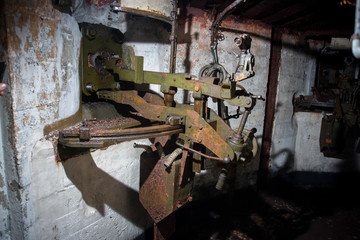 An abandoned bunker, an old military pillbox, an infantry weapon preserved after the war
