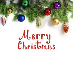 Wide Christmas border, isolated on white, consisting of fresh fir branches of fir cones and Christmas balls. Lettering.