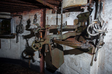 An abandoned bunker, an old military pillbox, an infantry weapon preserved after the war
