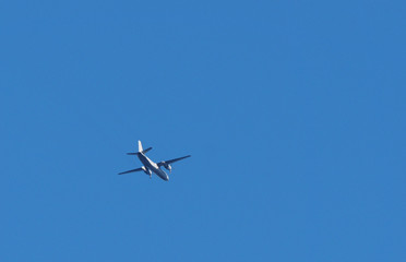 airplane against the blue sky