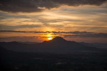 Blue and orange sunset sky with rays of sun. Natural landscape for background. soft and blur style for background.In New Year 2020. Sun rise, sunlight, sunbeam, sunshine, Naturally beautiful.