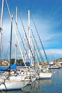 sailing boats lying in a yacht harbor