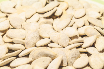 White pumpkin seeds fried close up