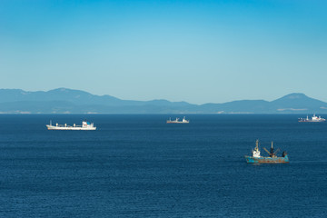 seascape with views of ships, sea and sky.