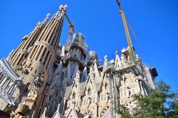 Gothic temple with high towers and different facades.