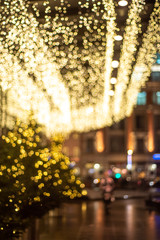 Christmas illumination, festively decorated. background blur