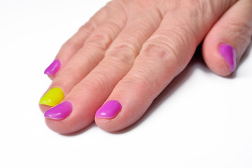 Rainbow pastel manicure. New Hybrid nails on white background