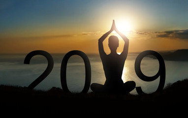 Yoga lifestyle. Happy new year 2019 greeting ard