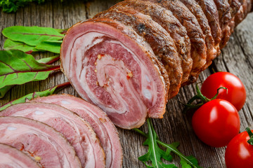 Veal roll filled with minced beef meat and herbs