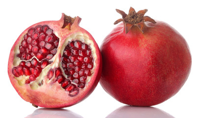 Big red pomegranate fruit and half pomegranate on white isolated background