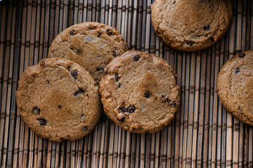 Chocolate cookies on the straw bedding.