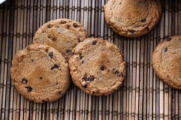 Chocolate cookies on the straw bedding.