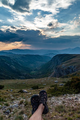 panoramic view of green valley with stones in Durmitor massif, Montenegro