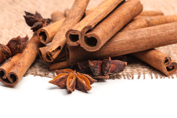 Cinnamon sticks and star anise isolated on white background