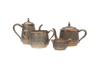 Vintage tea set of silver on white background. In isolation.