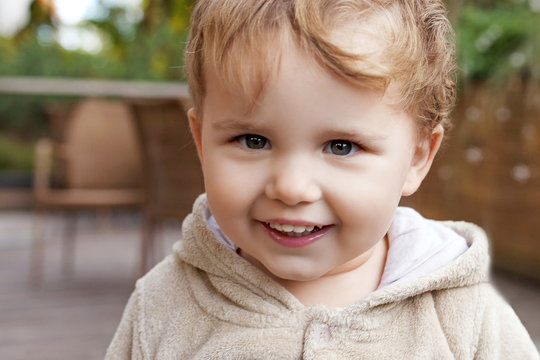 Portrait of cute  little  boy. Happy lovley child looking at camera