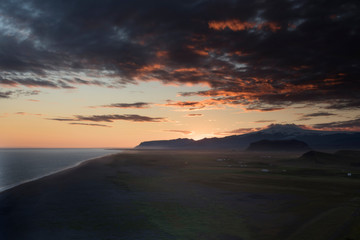Fototapeta na wymiar Unbelievable summer evening scene on the Vik, durholaey. Colorful sunset in Iceland, Europe. Beauty of nature concept background.