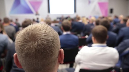 Heads of people in auditorium. Buiseness conference. focus on head
