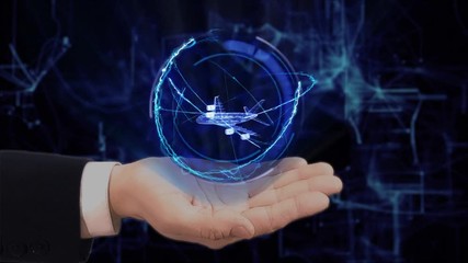 Painted hand shows concept hologram 3d plane on his hand. Drawn man in business suit with future technology screen and modern cosmic background - Powered by Adobe