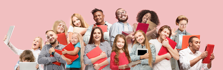 Collage about people hugging laptop. Love to computer concept. Attractive male and female portrait, trendy pink studio backgroud. Young emotional group. Human emotions, facial expression concept.