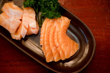 Raws fresh salmon fillet on dish in restaurant
