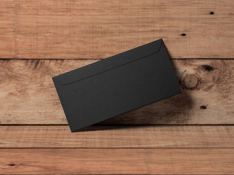 Black Paper Envelope Mockup On Wooden Background