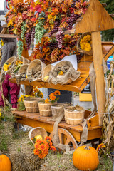 Halloween pumpkin and hay decorations.