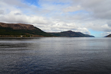 Loch Ness Lake and hills overround  in Scotland