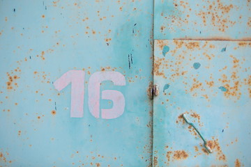 industrial background, texture of old painted metal with number 16