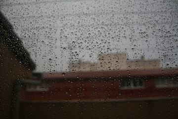 RAIN BEHIND THE WINDOW