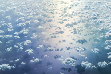 Clouds over sea from airplane.
