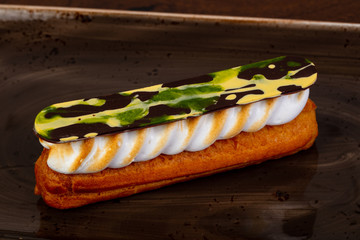 Tasty Eclair with cream