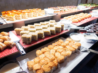 Pastries, pastries on the table in the restaurant. Hotel interior, buffet table, dessert, all inclusive.	