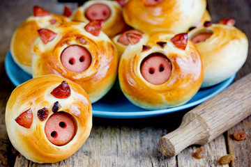 Piggies buns stuffed with sausage close up