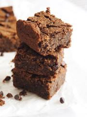 Homemade baked stack brownie pieces, close up